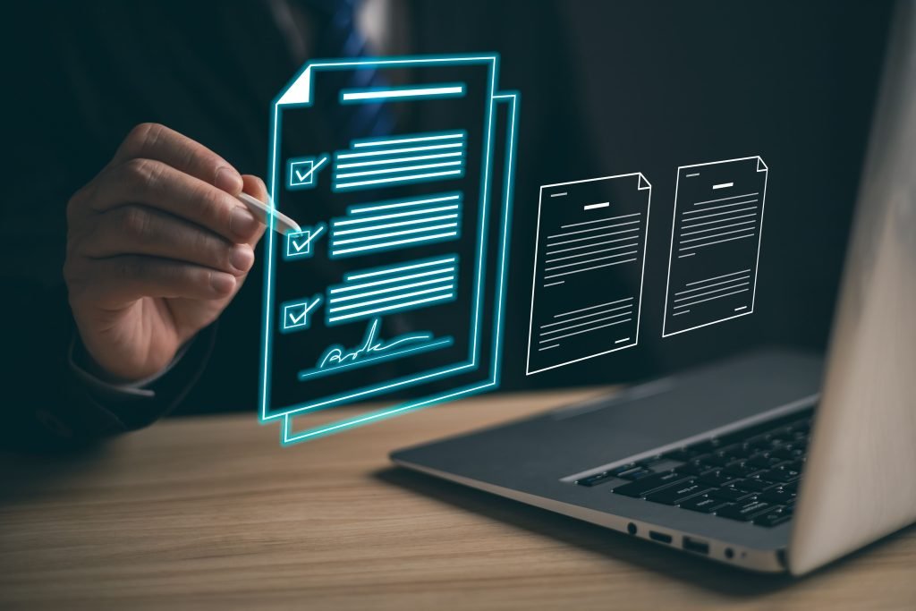 vecteezy-businessman-sign-digital-documents-online-in-the-office-45983473